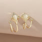 🌸✨ Pendientes de Ojo de Gato con Flores y Brillantes – Elegancia y Romance en Cada Detalle 💖💎