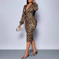 Vestido de 2026 con estampado de leopardo y escote en V.