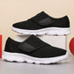 Adjustable orthopedic unisex sneakers with velcro closure and mesh design.