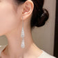 ✨ Elegantes pendientes en forma de lágrima: ¡estilo chic francés con circonitas brillantes! 💎🤍