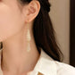 ✨ Elegantes pendientes en forma de lágrima: ¡estilo chic francés con circonitas brillantes! 💎🤍