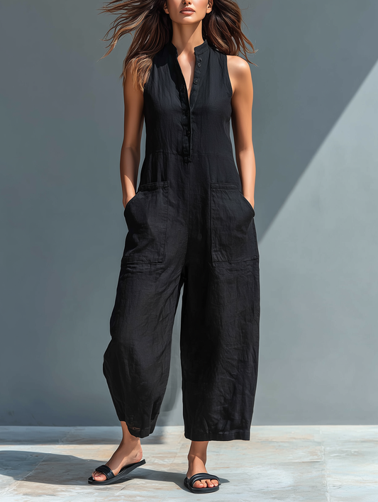Minimalistisk damjumpsuit i linneblandning med knäppning och ärmlös löst sittande
