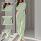 Kvinnlig Jumpsuit med Vida Ben – Sidfickor & Mjuk Polyester