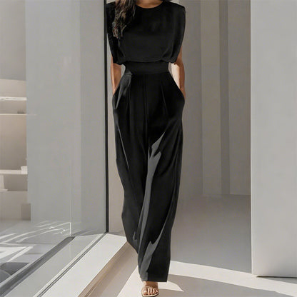 Kvinnlig Jumpsuit med Vida Ben – Sidfickor & Mjuk Polyester